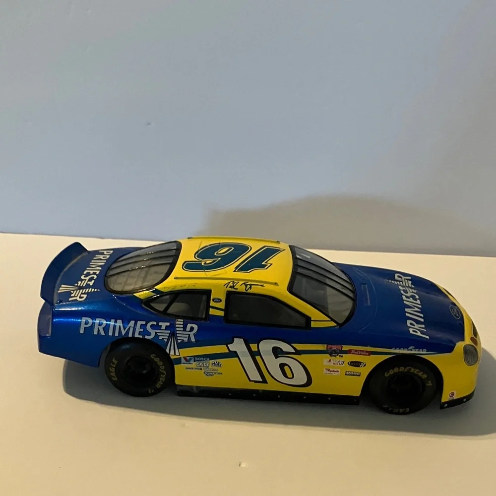 #16 Primestar Ford Taurus,‎ driven by Ted Musgrave in NASCAR Diecast 8”x3”